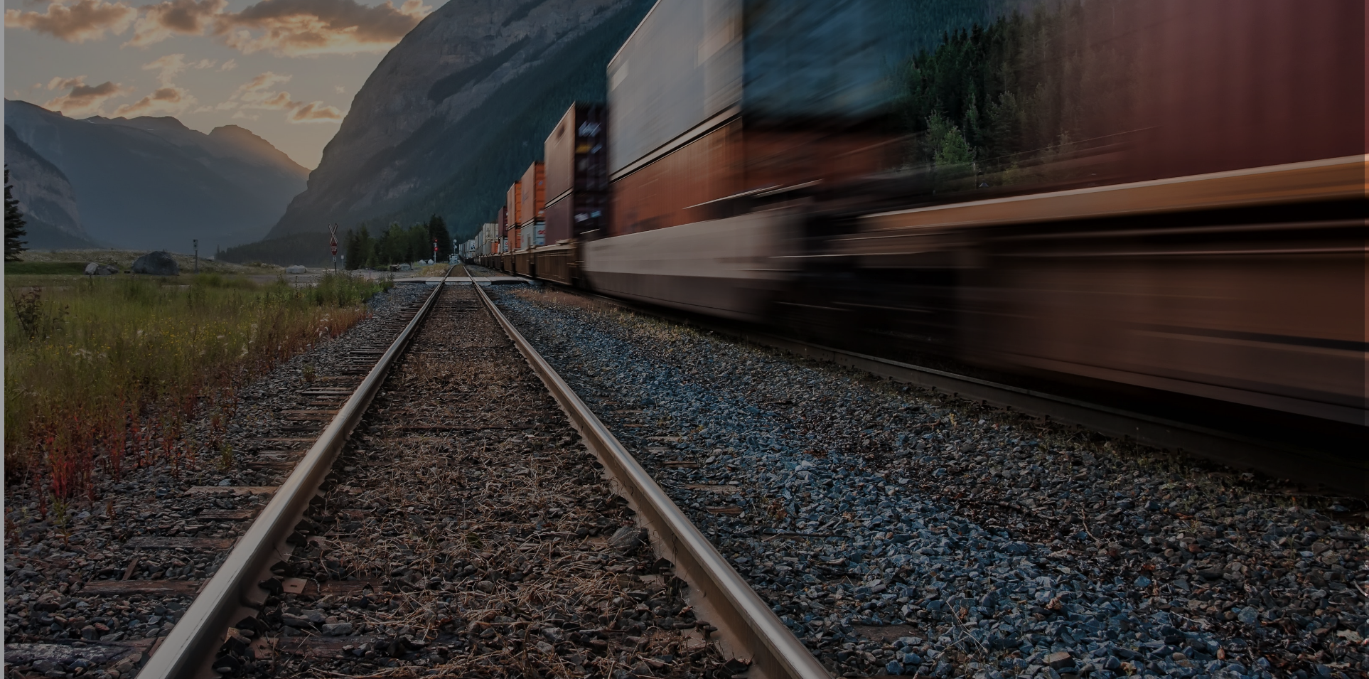 motion view of containers on rail cars