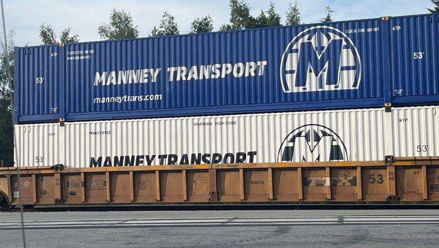 Manney Transport containers double-stacked